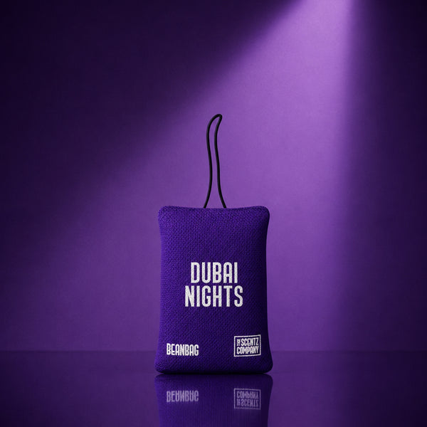 Dubai Nights scented car air freshener beanbag by The Scentz Company placed inside car interior delivering luxury oud long lasting fragrance