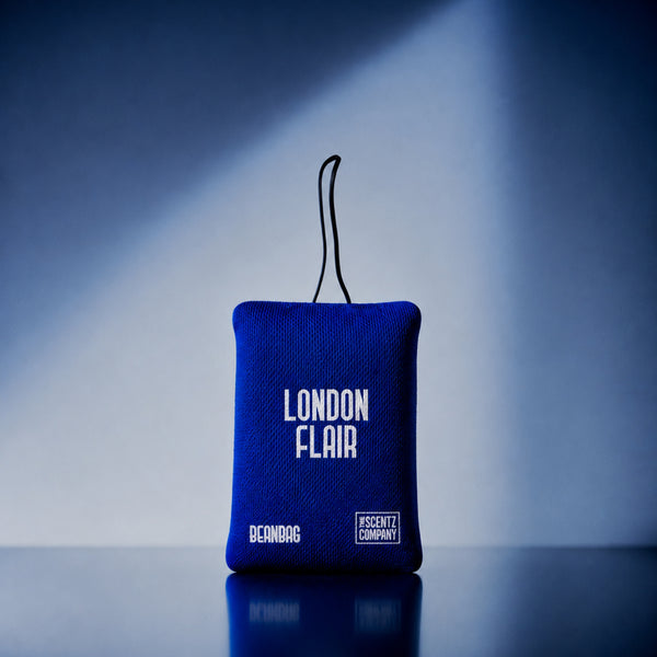 London Flair scented car air freshener beanbag by The Scentz Company placed inside car interior delivering fresh citrus long lasting fragrance