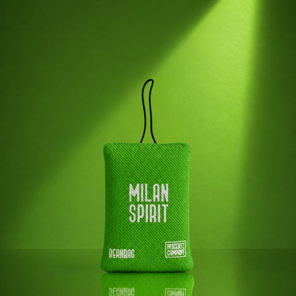 Milan Spirit scented car air freshener beanbag by The Scentz Company placed inside car interior delivering citrus herbal long lasting fragrance