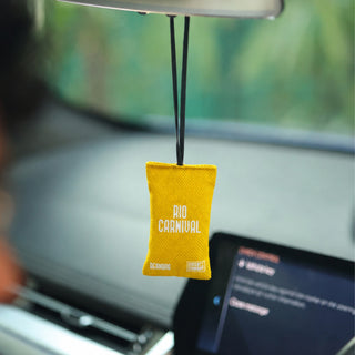 Rio Carnival scented car air freshener beanbag by The Scentz Company inside car interior delivering tropical fruity long lasting fragrance